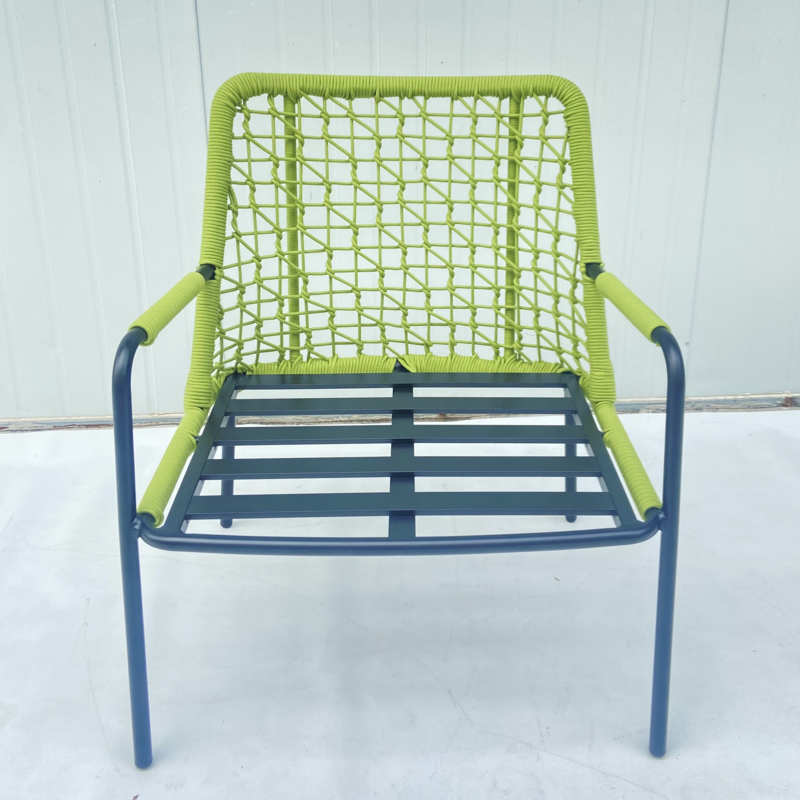 Green rope weaved outdoor lounge chair with cushions